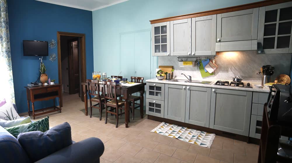 Melpomene. Equipped kitchenette with table extendable. Le Muse Holiday Apartments Bevagna historic center